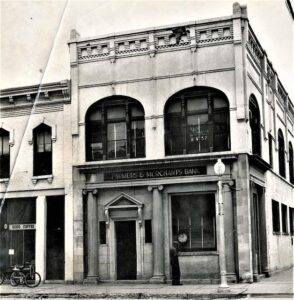 Farmer & Merchants Bank on the corner of 2nd Street and Main Ave. Previously was the First National Bank location.